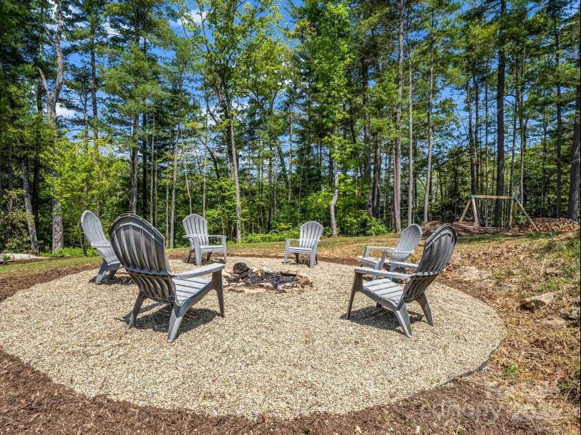 1351 Chanteloup Drive, Hendersonville, NC 28739.  MLS# CAR4250000, YatesRealty ID 24151. Peaceful, private firepit area