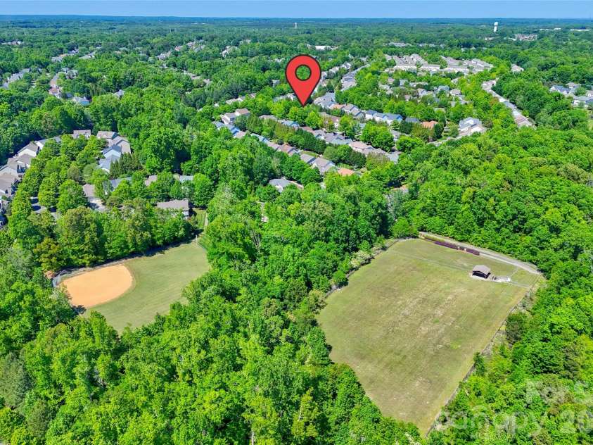 1005 Feather Oak Lane, Matthews, NC 28104.  MLS# CAR4383227, YatesRealty ID 24153. 