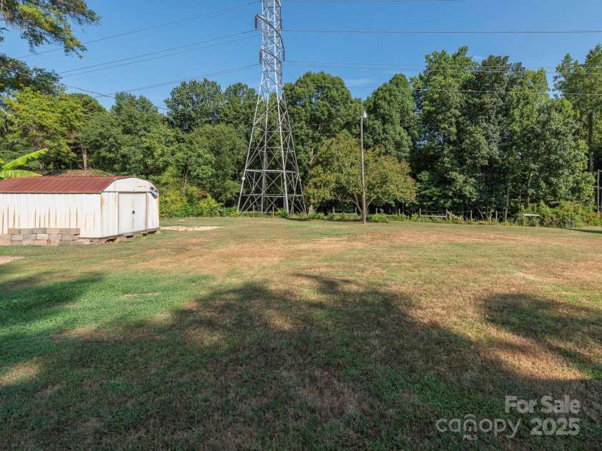 876 Stowe Lane, Gastonia, NC 28056.  MLS# CAR4260453, YatesRealty ID 24153. Backyard