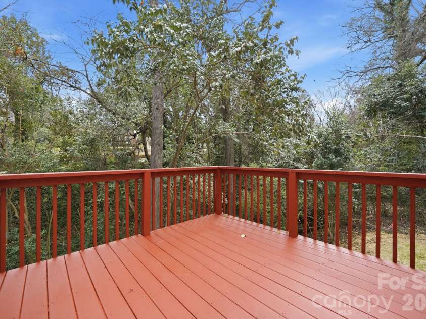 34 Louise Drive, Concord, NC 28025.  MLS# CAR4353554, YatesRealty ID 24154. Side Raised Deck