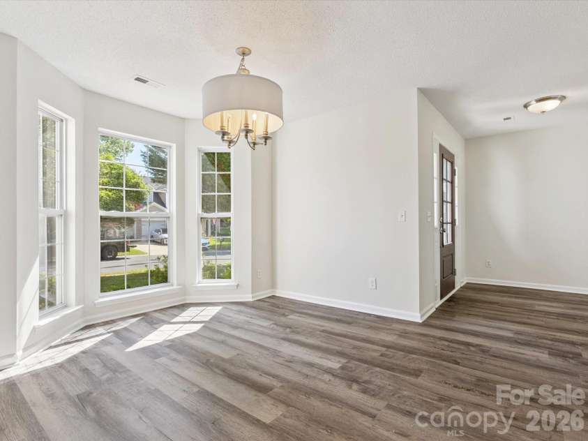 411 Carlisle Drive, Indian Trail, NC 28079.  MLS# CAR4271998, YatesRealty ID 24156. Breakfast area overlooking the back yard