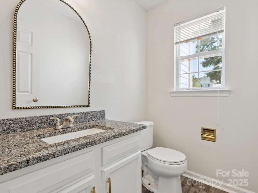 411 Carlisle Drive, Indian Trail, NC 28079.  MLS# CAR4271998, YatesRealty ID 24156. Half Bath on Main Floor