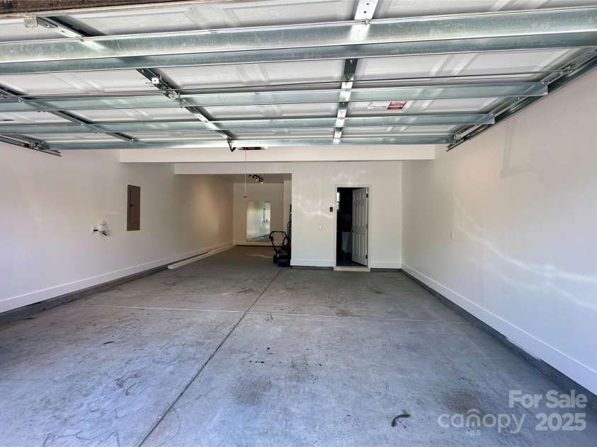 11101 Crane Creek Drive, Charlotte, NC 28278.  MLS# CAR4258259, YatesRealty ID 24160. Three car tandem garage
