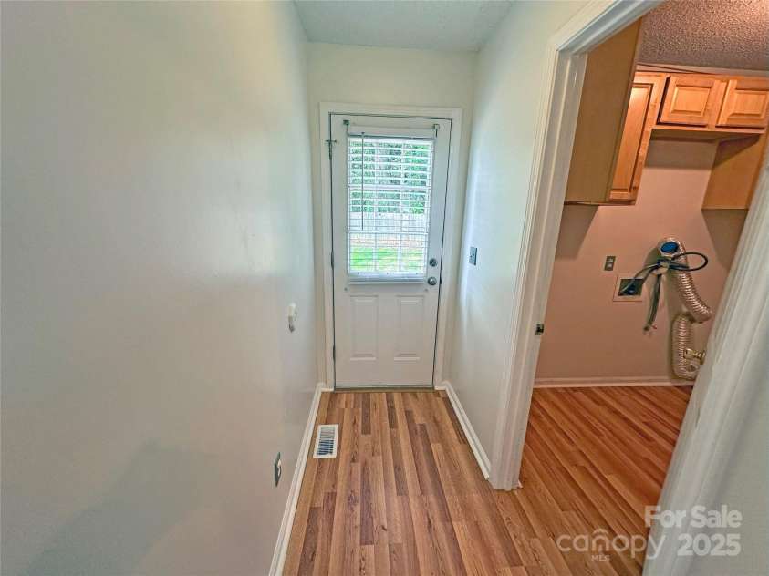 117 Blackberry Lane, Mooresville, NC 28117.  MLS# CAR4258834, YatesRealty ID 24161. Back door
