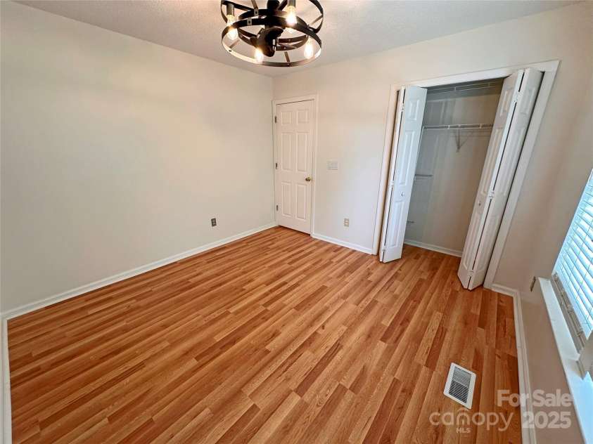 117 Blackberry Lane, Mooresville, NC 28117.  MLS# CAR4258834, YatesRealty ID 24161. Bedroom 2