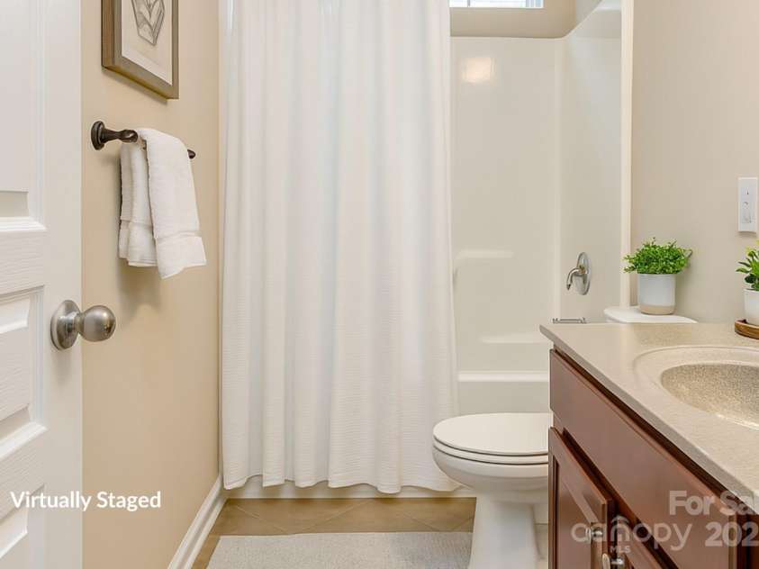 3104 Streamhaven Drive, Indian Land, SC 29707.  MLS# CAR4309394, YatesRealty ID 24162. Guest Bathroom - Virtually Staged