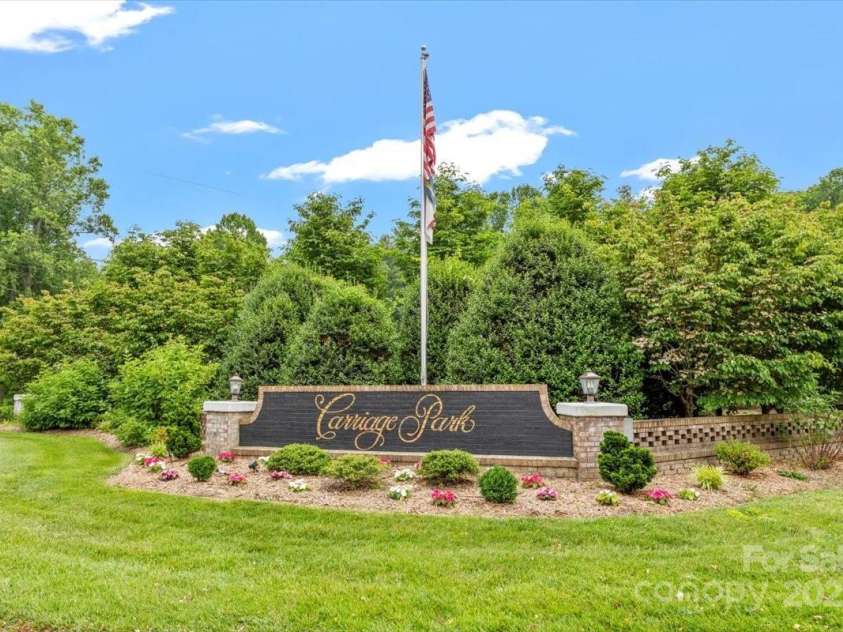 311 Carriage Crest Drive, Hendersonville, NC 28791.  MLS# CAR4263699, YatesRealty ID 24164. Carriage Park entrance.