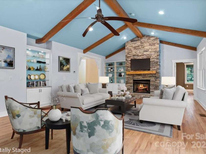 311 Carriage Crest Drive, Hendersonville, NC 28791.  MLS# CAR4263699, YatesRealty ID 24164. Digitally staged living room