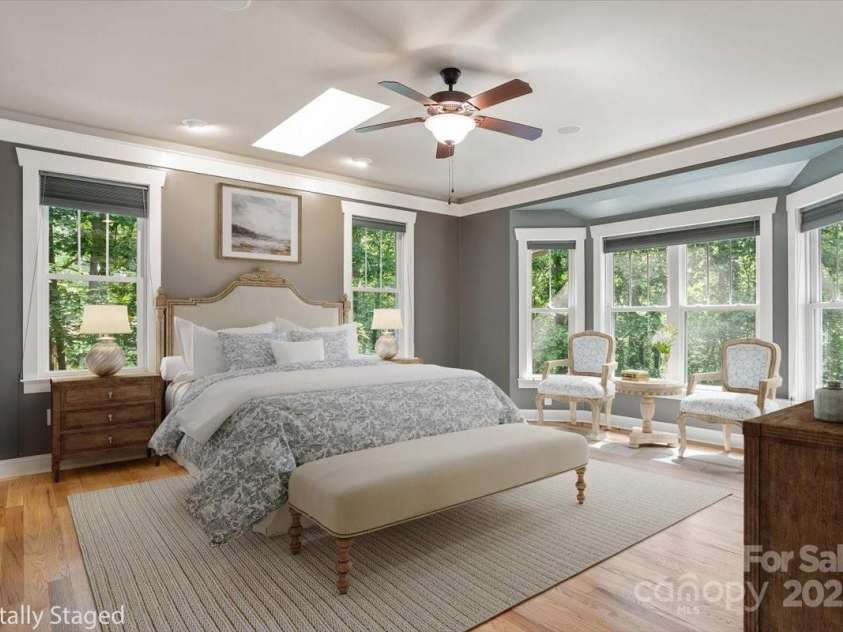 311 Carriage Crest Drive, Hendersonville, NC 28791.  MLS# CAR4263699, YatesRealty ID 24164. Digitally staged primary suite