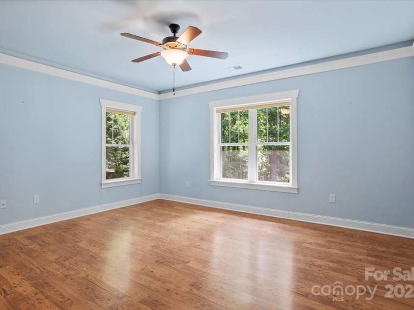 311 Carriage Crest Drive, Hendersonville, NC 28791.  MLS# CAR4263699, YatesRealty ID 24164. Lower level bedroom with en suite bathroom.