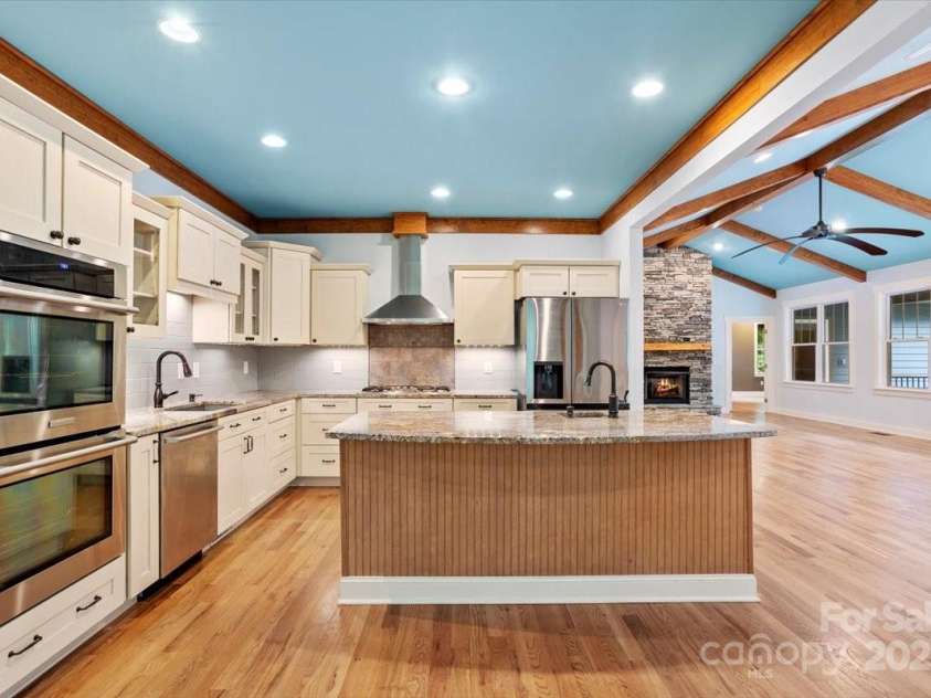 311 Carriage Crest Drive, Hendersonville, NC 28791.  MLS# CAR4263699, YatesRealty ID 24164. View from the breakfast nook looking into the kitchen.