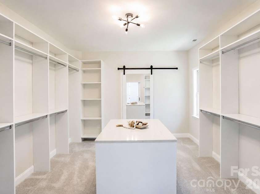 1378 Valhalla Drive, Denver, NC 28037.  MLS# CAR4346551, YatesRealty ID 24168. This is a full size room with custom shelves !