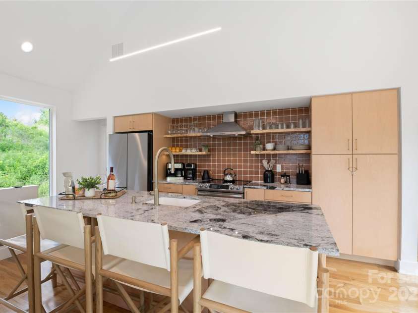 7 & 9 Big Rocky Top Drive, Weaverville, NC 28787.  MLS# CAR4260430, YatesRealty ID 24168. 9 Big Rocky Top - Kitche with Breakfast bar Upper level