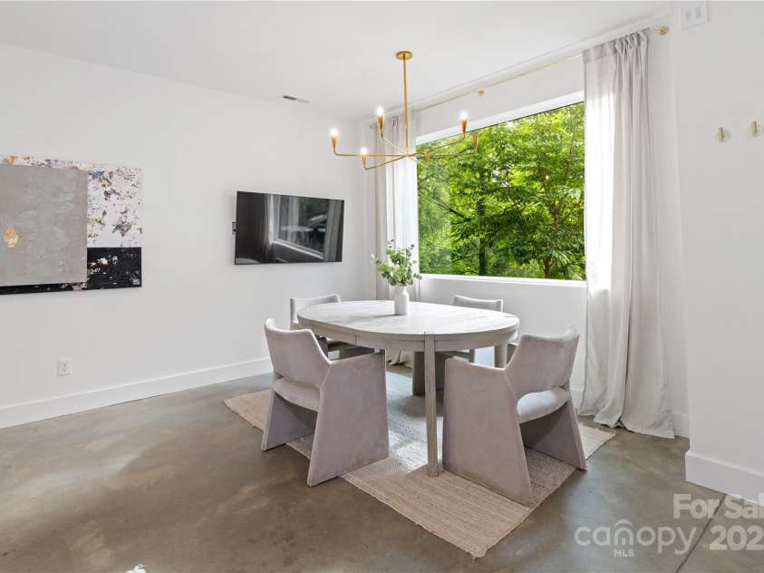 7 & 9 Big Rocky Top Drive, Weaverville, NC 28787.  MLS# CAR4260430, YatesRealty ID 24168. 9 Big Rocky Top - Welcoming Lower-Level Lounge