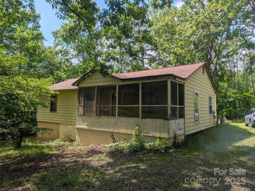 720 New Market Road, Tryon, NC 28782.  MLS# CAR4261255, YatesRealty ID 24169. Front