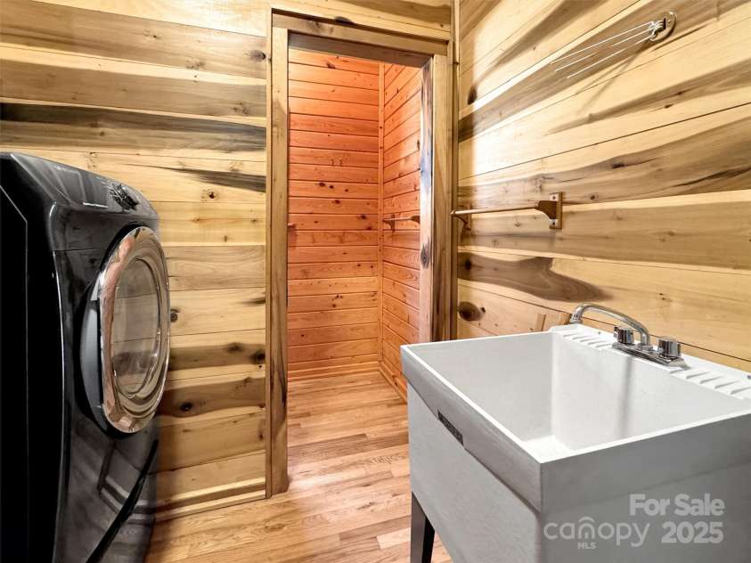 100 Tsali Drive, Waynesville, NC 28785.  MLS# CAR4244909, YatesRealty ID 24175. Laundry main level