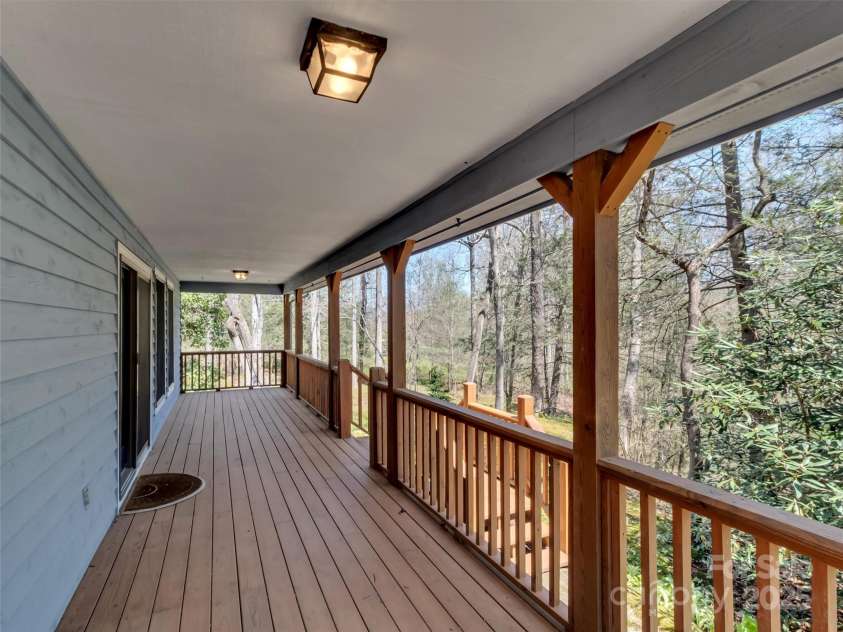 100 Tsali Drive, Waynesville, NC 28785.  MLS# CAR4244909, YatesRealty ID 24175. Main level deck