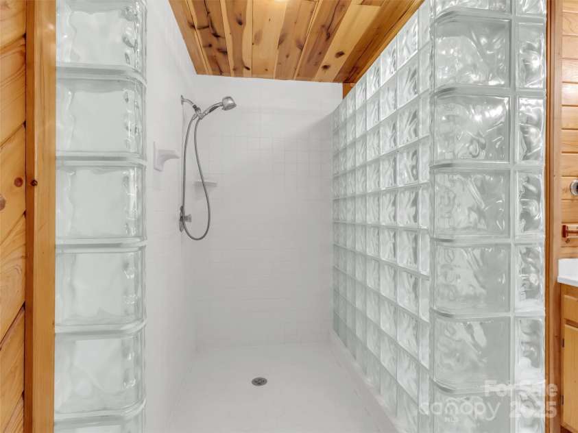 100 Tsali Drive, Waynesville, NC 28785.  MLS# CAR4244909, YatesRealty ID 24175. Upstairs shower
