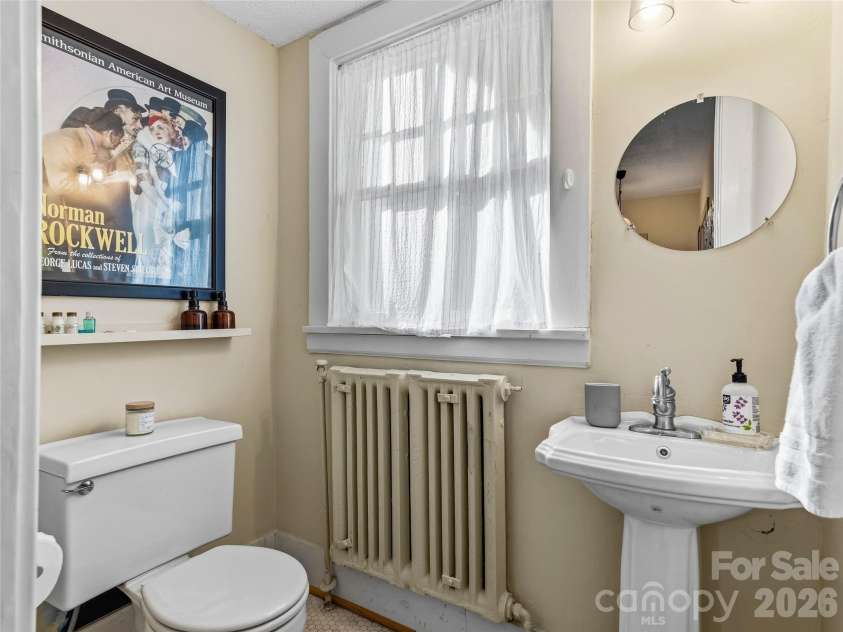 4 Duke Street, Asheville, NC 28803.  MLS# CAR4345320, YatesRealty ID 24175. Half Bath