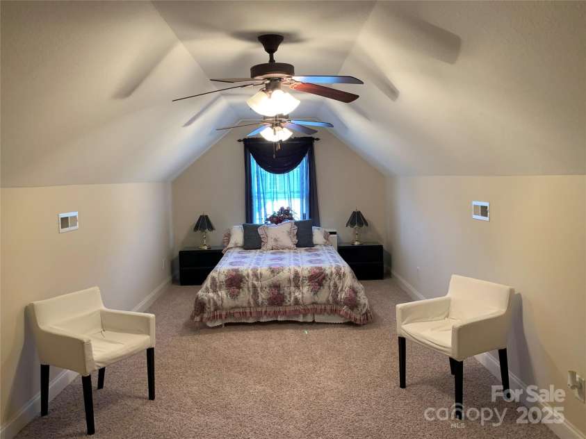 1575 Williamsburg Drive, Rock Hill, SC 29732.  MLS# CAR4267973, YatesRealty ID 24176. Bedroom or Bonus Room with walk-in closet and attic storage