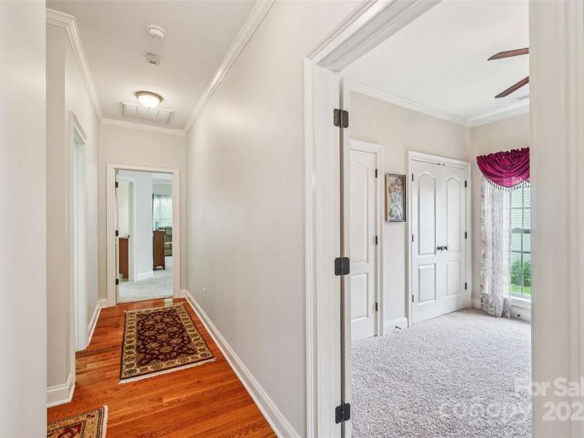 1575 Williamsburg Drive, Rock Hill, SC 29732.  MLS# CAR4267973, YatesRealty ID 24176. Hallway to Primary Suite