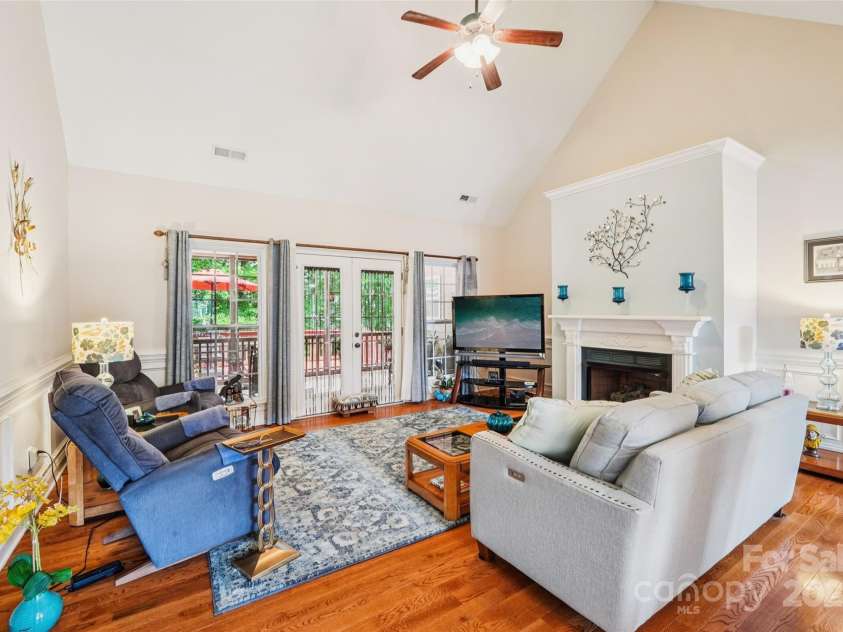 1575 Williamsburg Drive, Rock Hill, SC 29732.  MLS# CAR4267973, YatesRealty ID 24176. Living Room leads to Screen Porch