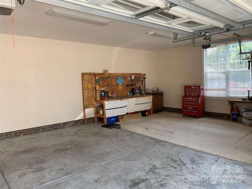 1575 Williamsburg Drive, Rock Hill, SC 29732.  MLS# CAR4267973, YatesRealty ID 24176. Workbench in Garage