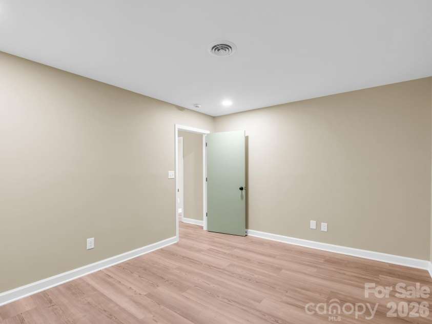 44 Jervey Road, Tryon, NC 28782.  MLS# CAR4381509, YatesRealty ID 24179. Office/den/flex space looking back toward the hallway.