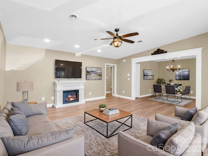 44 Jervey Road, Tryon, NC 28782.  MLS# CAR4381509, YatesRealty ID 24179. VIRTUALLY STAGED LIVING/DINING ROOMS.