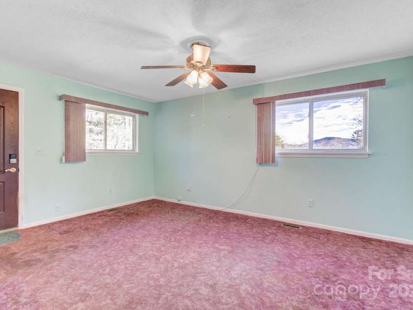 125 Freedom Road, Hendersonville, NC 28792.  MLS# CAR4329667, YatesRealty ID 2418. 