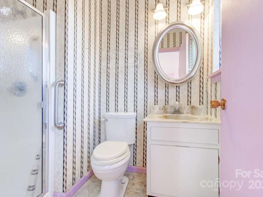 125 Freedom Road, Hendersonville, NC 28792.  MLS# CAR4329667, YatesRealty ID 2418. 