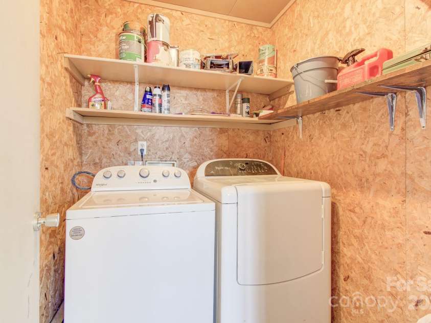 125 Freedom Road, Hendersonville, NC 28792.  MLS# CAR4329667, YatesRealty ID 2418. Heated Laundry Room!