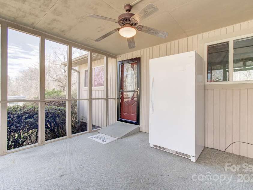 125 Freedom Road, Hendersonville, NC 28792.  MLS# CAR4329667, YatesRealty ID 2418. Screened Front Porch!