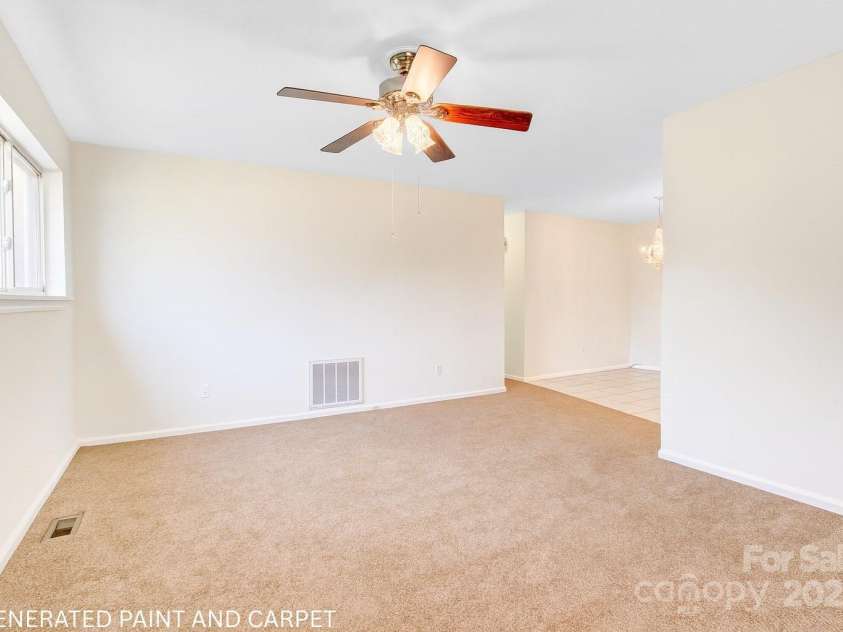 125 Freedom Road, Hendersonville, NC 28792.  MLS# CAR4329667, YatesRealty ID 2418. Virtual Updates to show change in wall color and flooring.