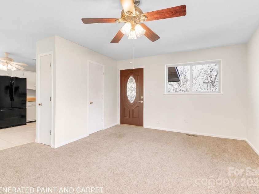 125 Freedom Road, Hendersonville, NC 28792.  MLS# CAR4329667, YatesRealty ID 2418. Virtual Updates to show change in wall color and flooring.