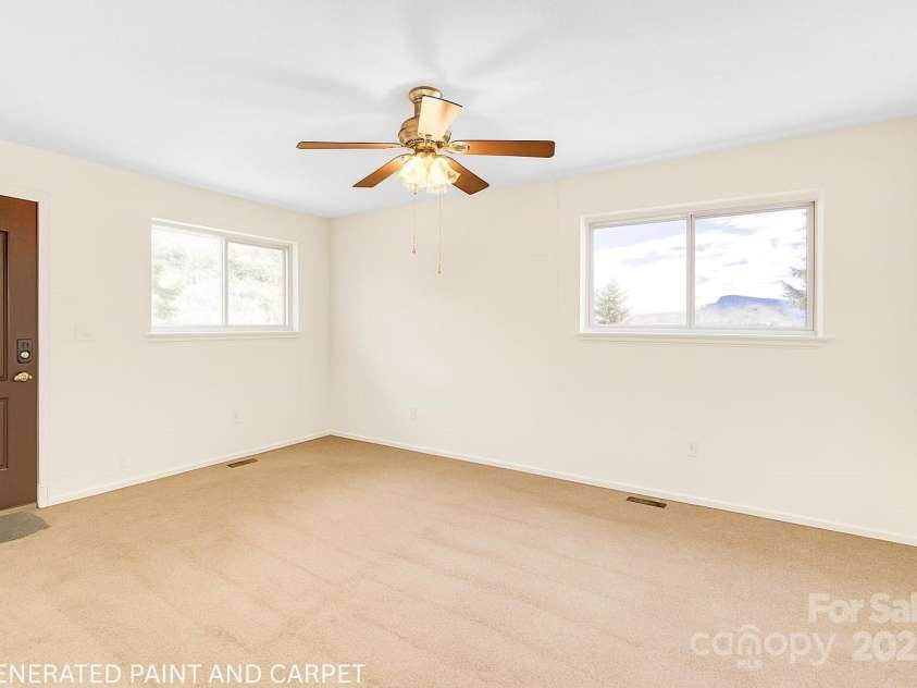 125 Freedom Road, Hendersonville, NC 28792.  MLS# CAR4329667, YatesRealty ID 2418. Virtual Updates to show change in wall color and flooring.