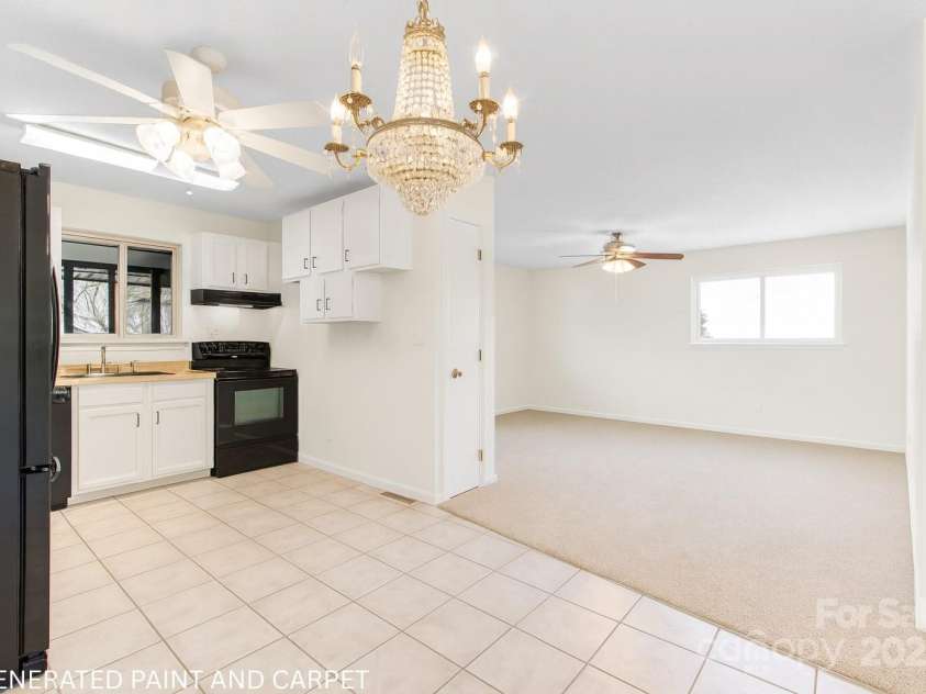 125 Freedom Road, Hendersonville, NC 28792.  MLS# CAR4329667, YatesRealty ID 2418. Virtual Updates to show change in wall color, cabinets and flooring.