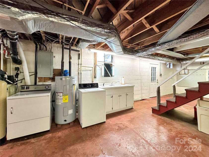 8031 George Hildebran School Road, Connelly Springs, NC 28612.  MLS# CAR4198034, YatesRealty ID 2418. Basement Laundry with utility sink