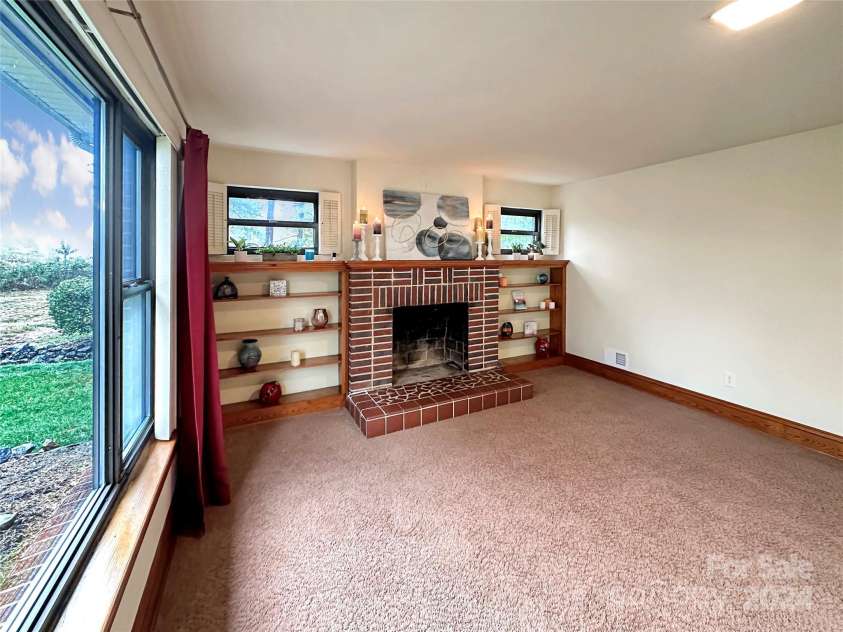 8031 George Hildebran School Road, Connelly Springs, NC 28612.  MLS# CAR4198034, YatesRealty ID 2418. Living Room with fireplace