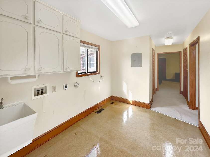 8031 George Hildebran School Road, Connelly Springs, NC 28612.  MLS# CAR4198034, YatesRealty ID 2418. Main Level Laundry room with utility sink