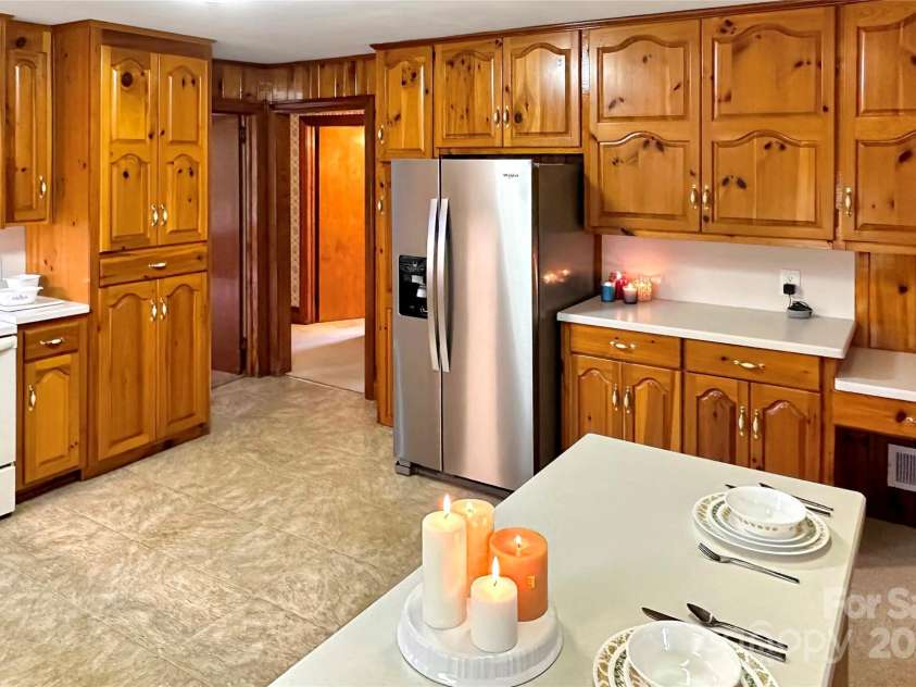 8031 George Hildebran School Road, Connelly Springs, NC 28612.  MLS# CAR4198034, YatesRealty ID 2418. Open concept den and eat-in kitchen