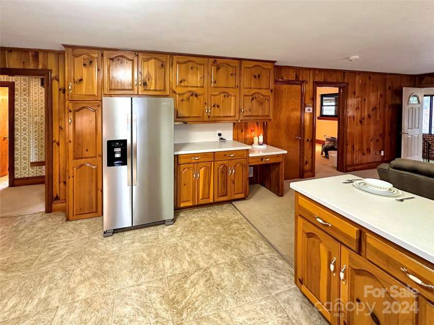 8031 George Hildebran School Road, Connelly Springs, NC 28612.  MLS# CAR4198034, YatesRealty ID 2418. Open concept den and eat-in kitchen