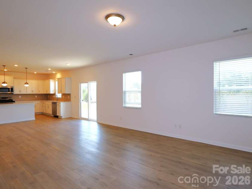 1350 Fremont Drive, Wingate, NC 28174.  MLS# CAR4382334, YatesRealty ID 24180. Family room