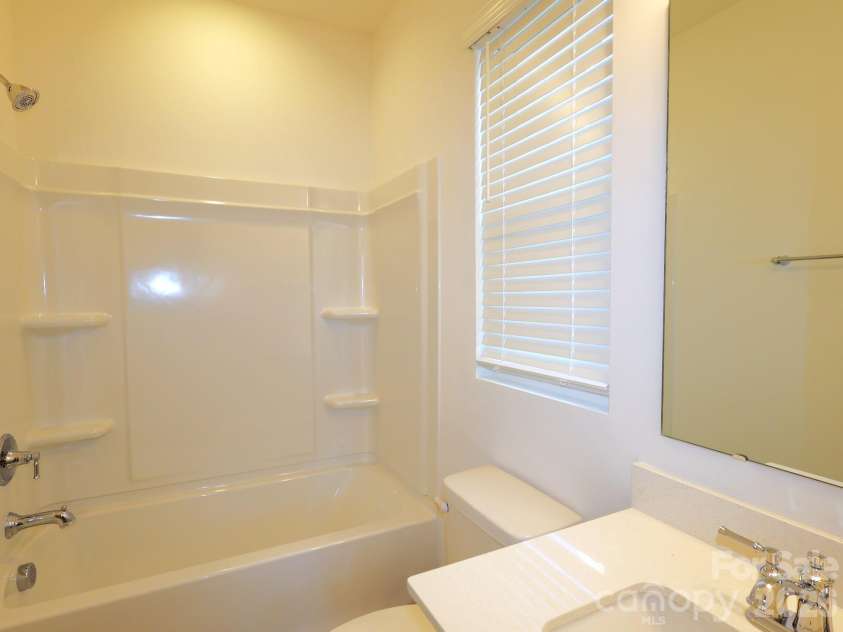 1350 Fremont Drive, Wingate, NC 28174.  MLS# CAR4382334, YatesRealty ID 24180. First floor bathroom