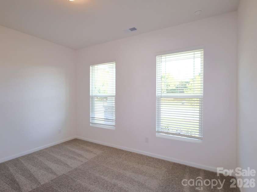 1350 Fremont Drive, Wingate, NC 28174.  MLS# CAR4382334, YatesRealty ID 24180. First floor bedroom