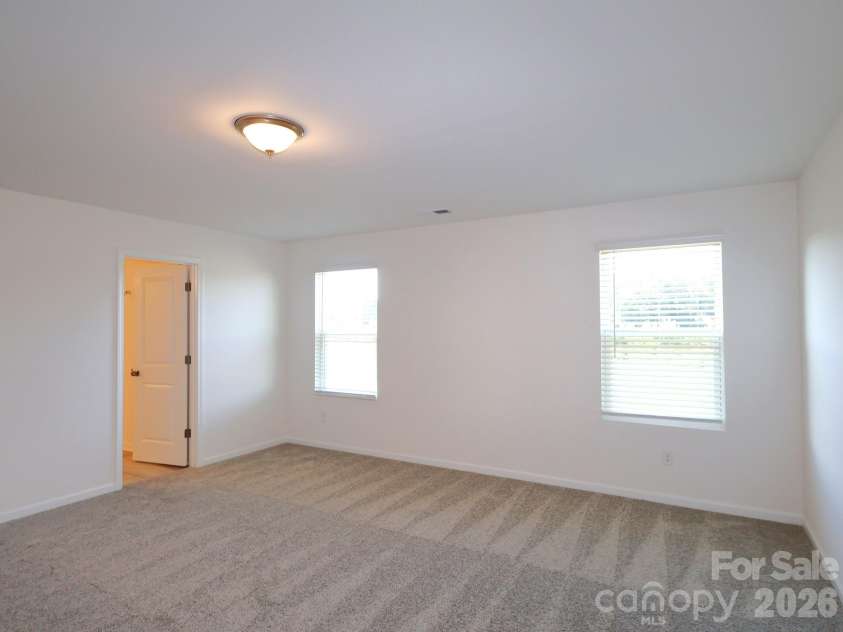 1350 Fremont Drive, Wingate, NC 28174.  MLS# CAR4382334, YatesRealty ID 24180. Owner's suite