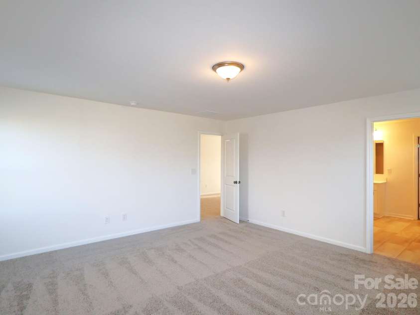 1350 Fremont Drive, Wingate, NC 28174.  MLS# CAR4382334, YatesRealty ID 24180. Owner's suite
