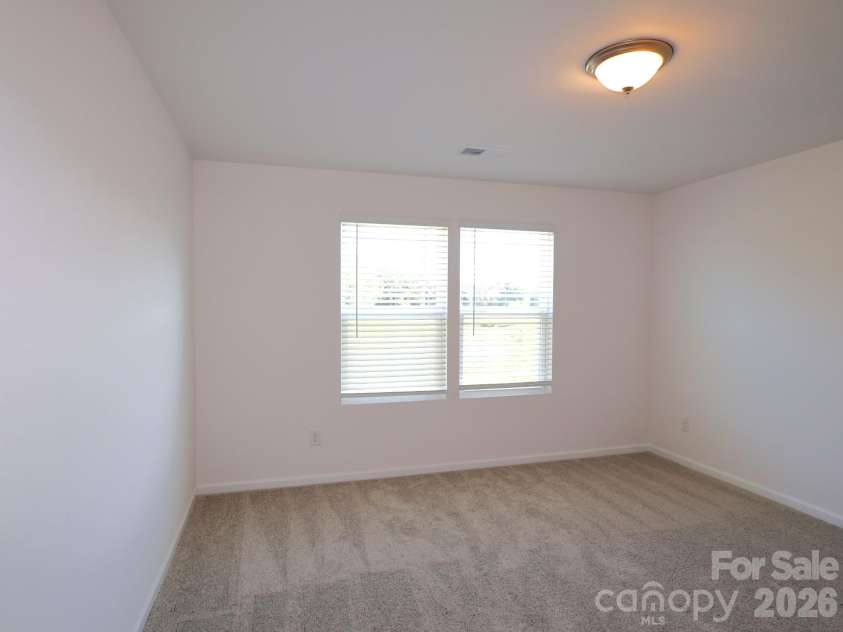 1350 Fremont Drive, Wingate, NC 28174.  MLS# CAR4382334, YatesRealty ID 24180. Secondary bedroom
