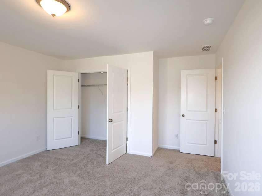 1350 Fremont Drive, Wingate, NC 28174.  MLS# CAR4382334, YatesRealty ID 24180. Secondary bedroom