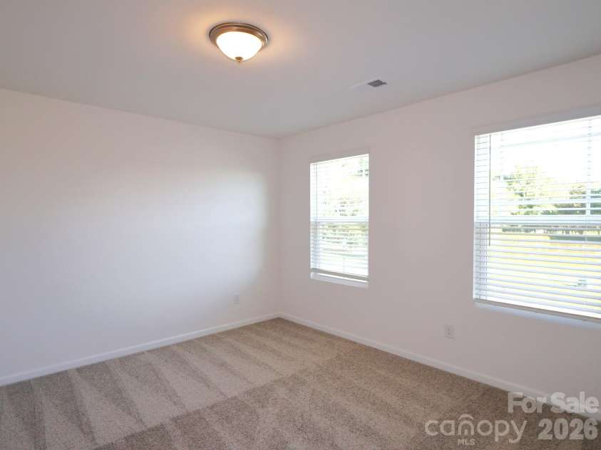 1350 Fremont Drive, Wingate, NC 28174.  MLS# CAR4382334, YatesRealty ID 24180. Secondary bedroom